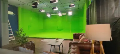 Production-Friendly Studio with Green Screen and Podcast Setup image 4